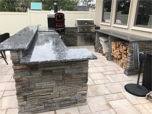 Pheasant Cultured Stone Custom BBQ Pizza Oven Wood Storage Fridge Outdoor Paver Patio Boral Granite Top Sink Cambridge Ledgestone Smooth Sandstone